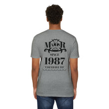 MAJBWR - Scripted Crest T‑Shirt — Minimalist Monogram Logo Tee